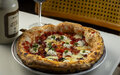 Imagem de destaque para Dia da Pizza em SP: 29 restaurantes imperdíveis para comemorar a data em grande estilo