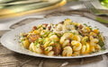 Imagem de destaque para Espiral ao Molho de Abóbora com Couve e Linguiça: receita fácil, nutritiva e irresistível