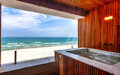 Imagem de destaque para Hotel pé na areia em Maresias promete luxo, natureza e um pôr do sol inesquecível