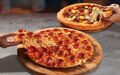Imagem de destaque para Domino’s Pizza lança promoção imperdível: leve 2 pizzas e pague só 1