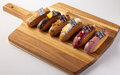 Imagem de destaque para Chefs estreladas criam versões exclusivas de éclair para aniversário da Confeitaria DAMA