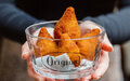Imagem de destaque para Dia da Coxinha: onde comer o salgado mais amado em São Paulo