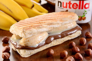 Restaurantes: Lanchonete inova com cachorro-quente doce de banana com Nutella em seu cardápio